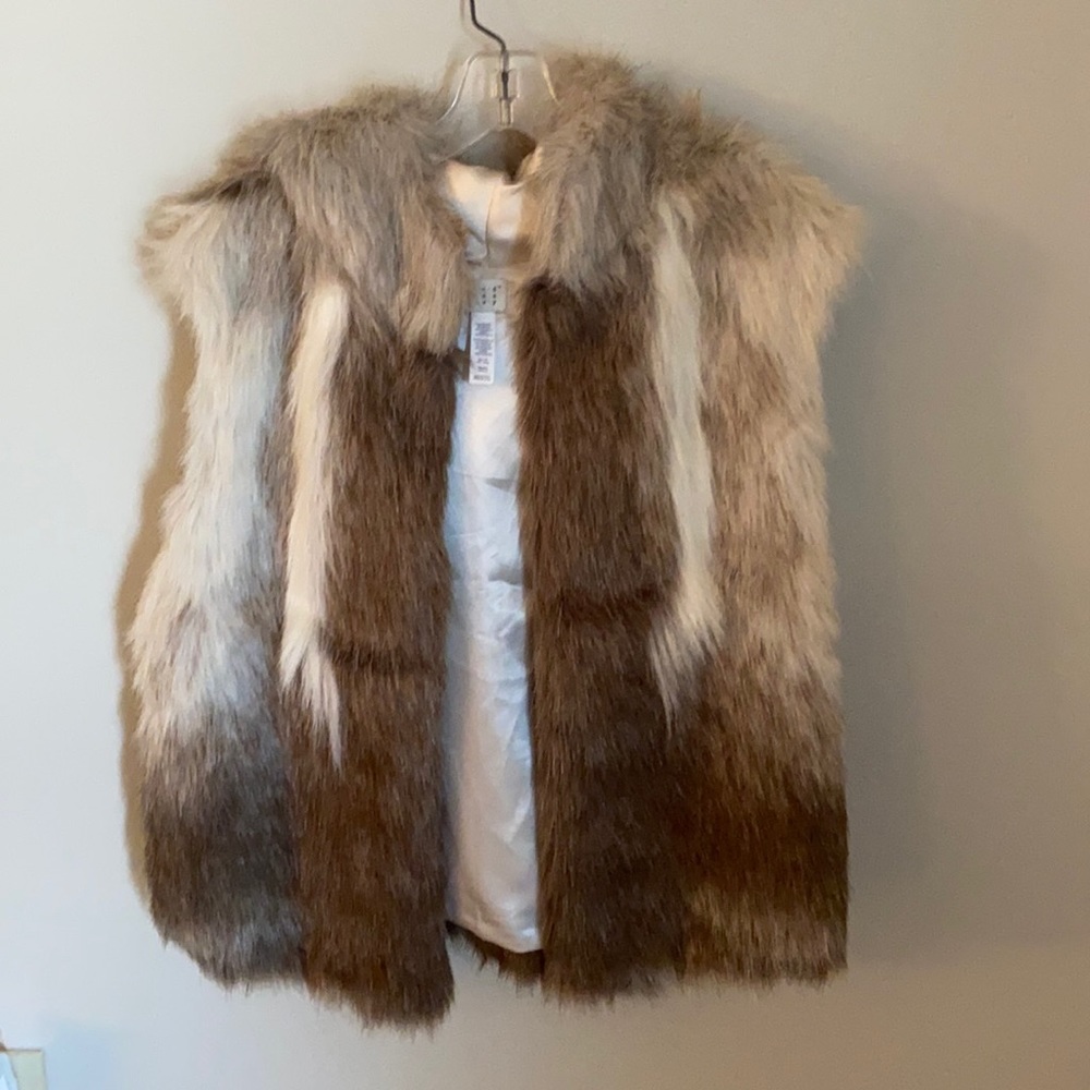 Fur vest with hood